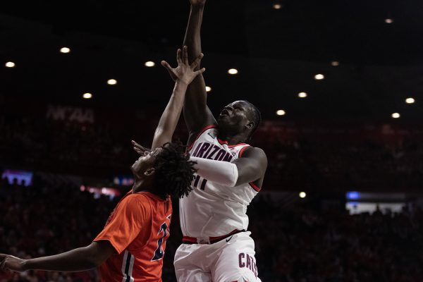 Arizona mens basketball player Oumar Ballo attempts to score points against Morgan State on Nov. 7 in McKale Center. The wildcats won the game 122-59.