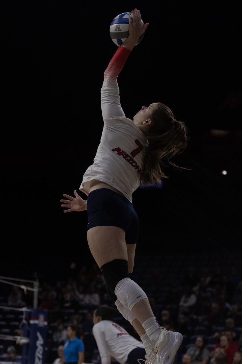 Arizona volleyball player Ana Heath serves a ball during the game against Utah on Nov. 9 in McKale Center. The Wildcats went on to win the game 3-1.