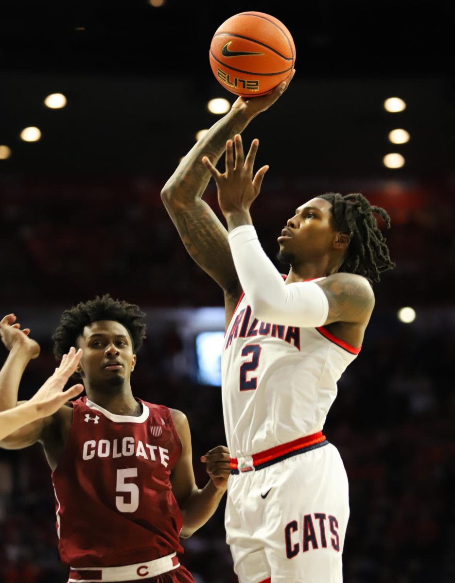 Caleb Love pulls up for a mid range shot in the opening minutes of Arizona's home game against Colgate on Dec. 2. Love finished the game with three steals and only two rebounds short of a double double.
