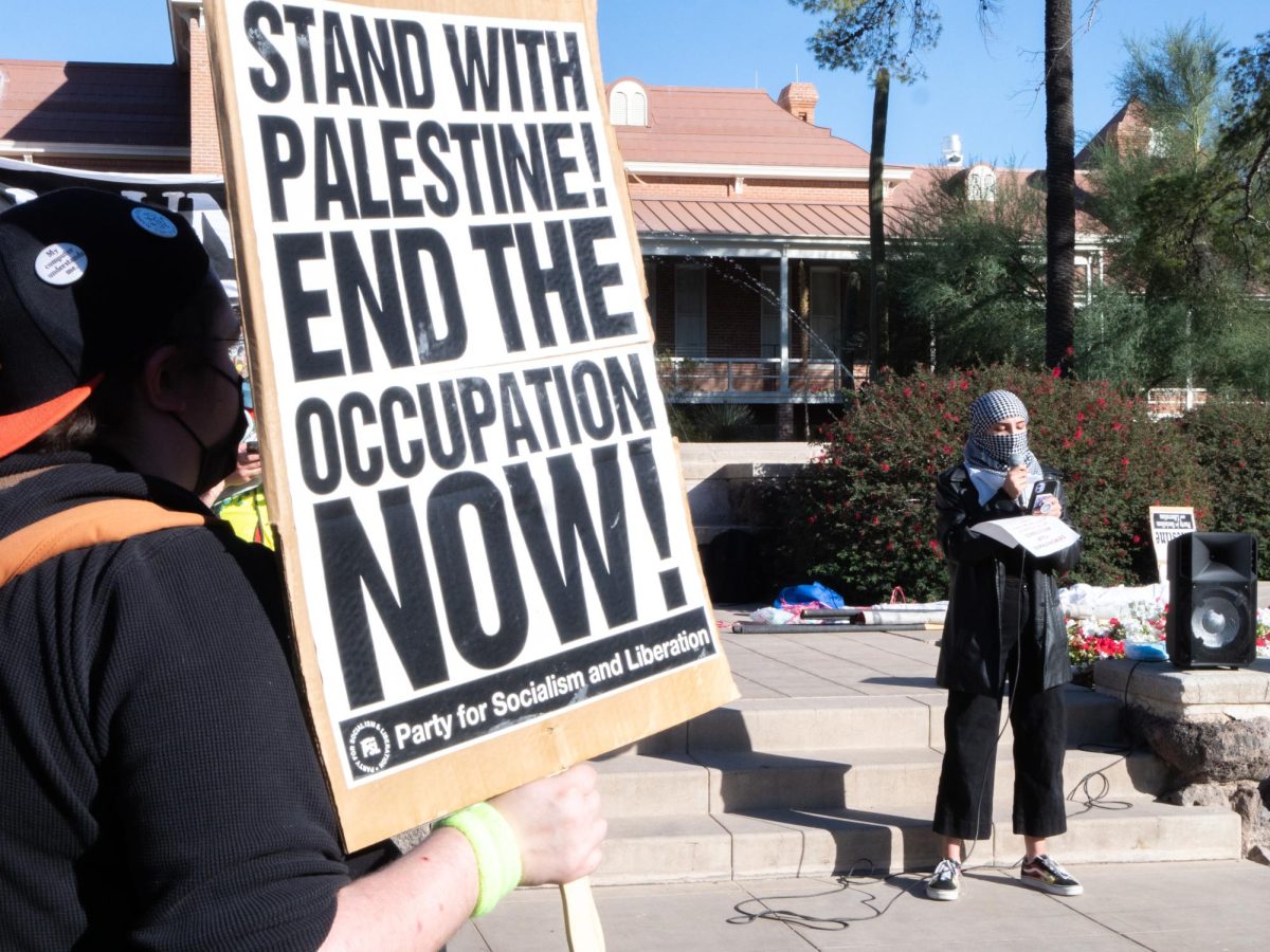 A speaker talks at the Walkout for Palestine on Nov. 9, 2023, at the University of Arizona. The event was put on by the Arizona Palestine Solidarity Alliance, the Tucson Peace Center, The Party for Socialism & Liberation and more. 
