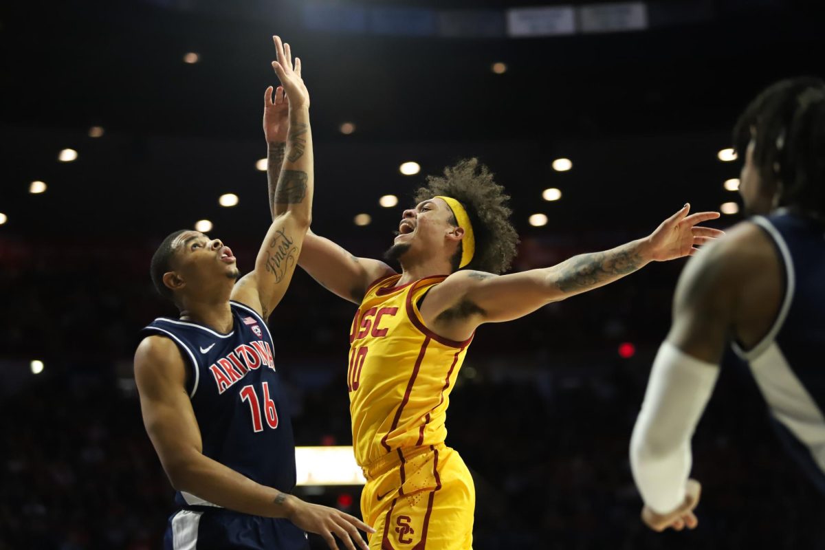 Keshad Johnson contests a USC shot in the closing seconds of the first half to maintain a 10 point lead at home on Jan. 17 in McKale Center. The Wildcats took a win of 82-67.
