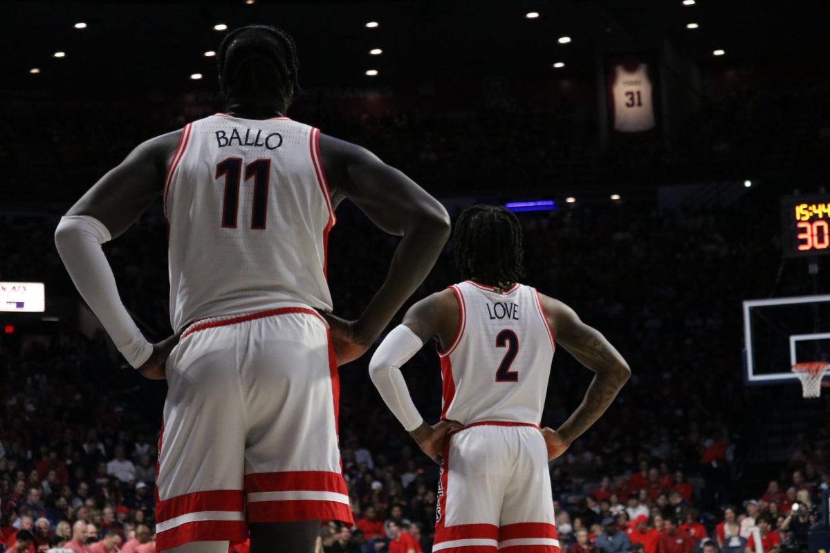 Oumar+Ballo+and+Caleb+Love+wait+to+play+against+Stanford+in+McKale+Center+on+Feb.+4.+Ballo+and+Love+each+scored+18+points.