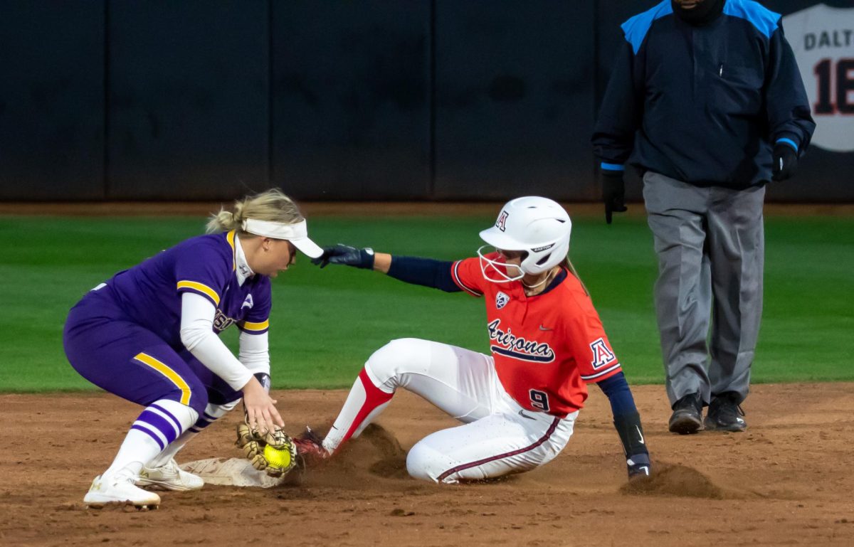 Arizona softball player Allie Skaggs successfully steals second on Friday Feb. 9, at Mike Candrea field at Rita Hillenbrand stadium. Arizona went on to sweep the Candrea Classic winning all 5 of their games by mercy rules. 
