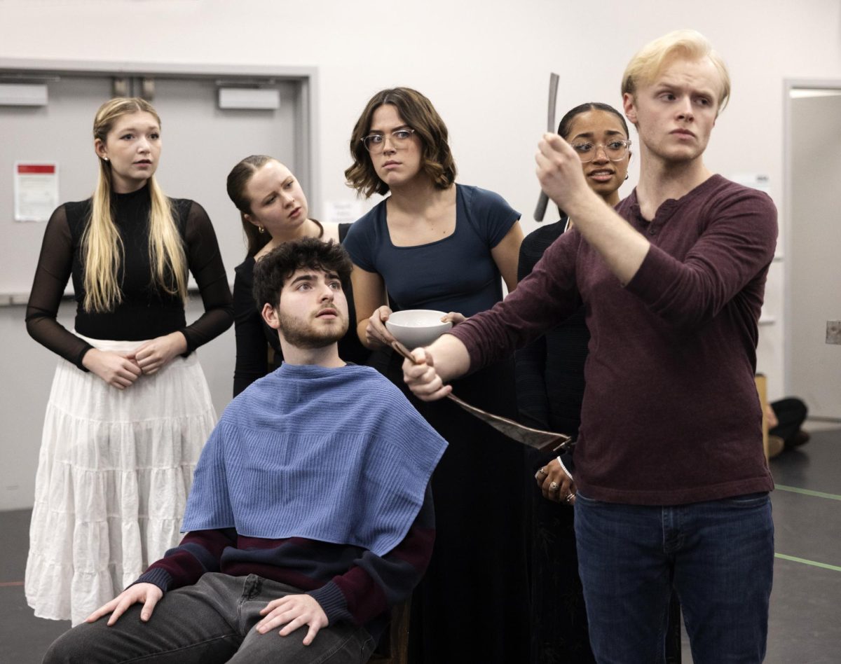 Cast members from left, Kinzie Pipkin, Katie Browne, Haiden Pederson, Noelle Robinson, Dovid Adler, and James Kelley Carroll rehearse for “Sweeney Todd.” The musical Feb. 25-March 17 reopens the Marrony Theater after a two-year renovation project. Photo courtesy of Tim Fuller.