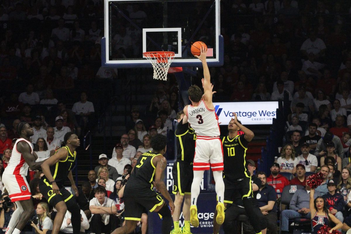 Arizonas Pelle Larsson goes to make a basket during the Oregon game on March 2 in McKale Center. To reach his 1,000 reach, Larsson needed 23 points.