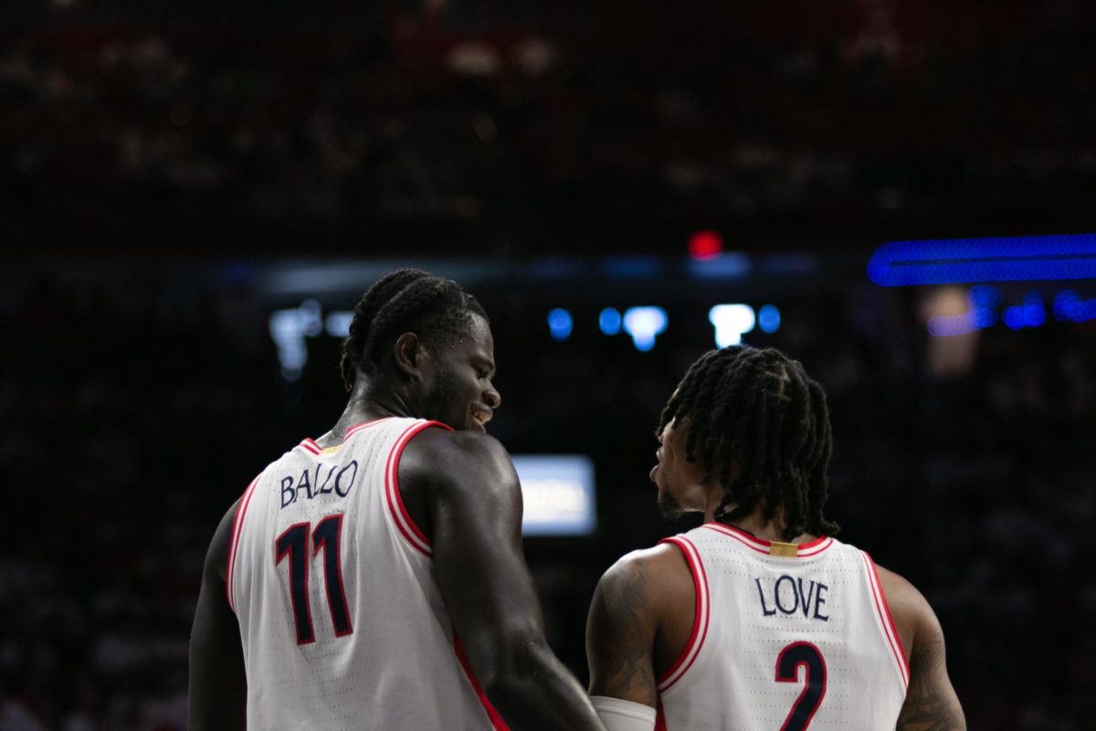 Oumar+Ballo+and+Caleb+Love+speak+to+each+other+early+in+the+first+half+of+their+game+against+Oregon+in+McKale+on+March+2.+Ballo+and+Love+were+both+recognized+as+seniors+during+this+game.