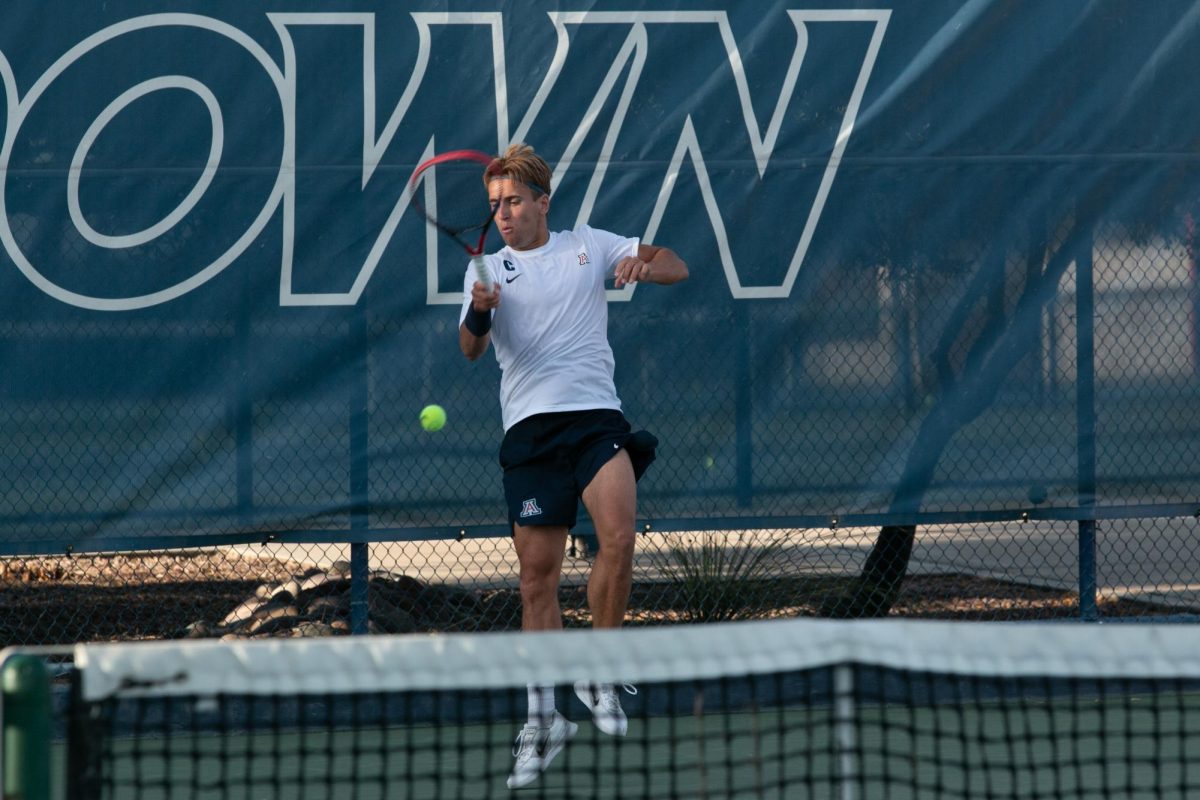 Gustaf Strom returns the ball in the final game of his set against his ASU opponent on April 7 at Robson Tennis Center. Strom’s singles match ran the longest and saw his hard-fought victory.