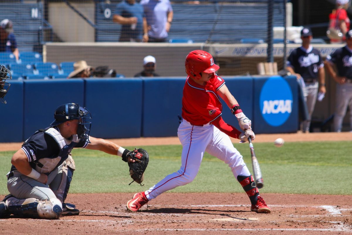 Garen Caulfield swings at a pitch in the first inning against DBU during the Tucson Regional of the NCAA Baseball Tournament on June 1. This loss would eliminate the Wildcats from their own regional and end Arizonas season.