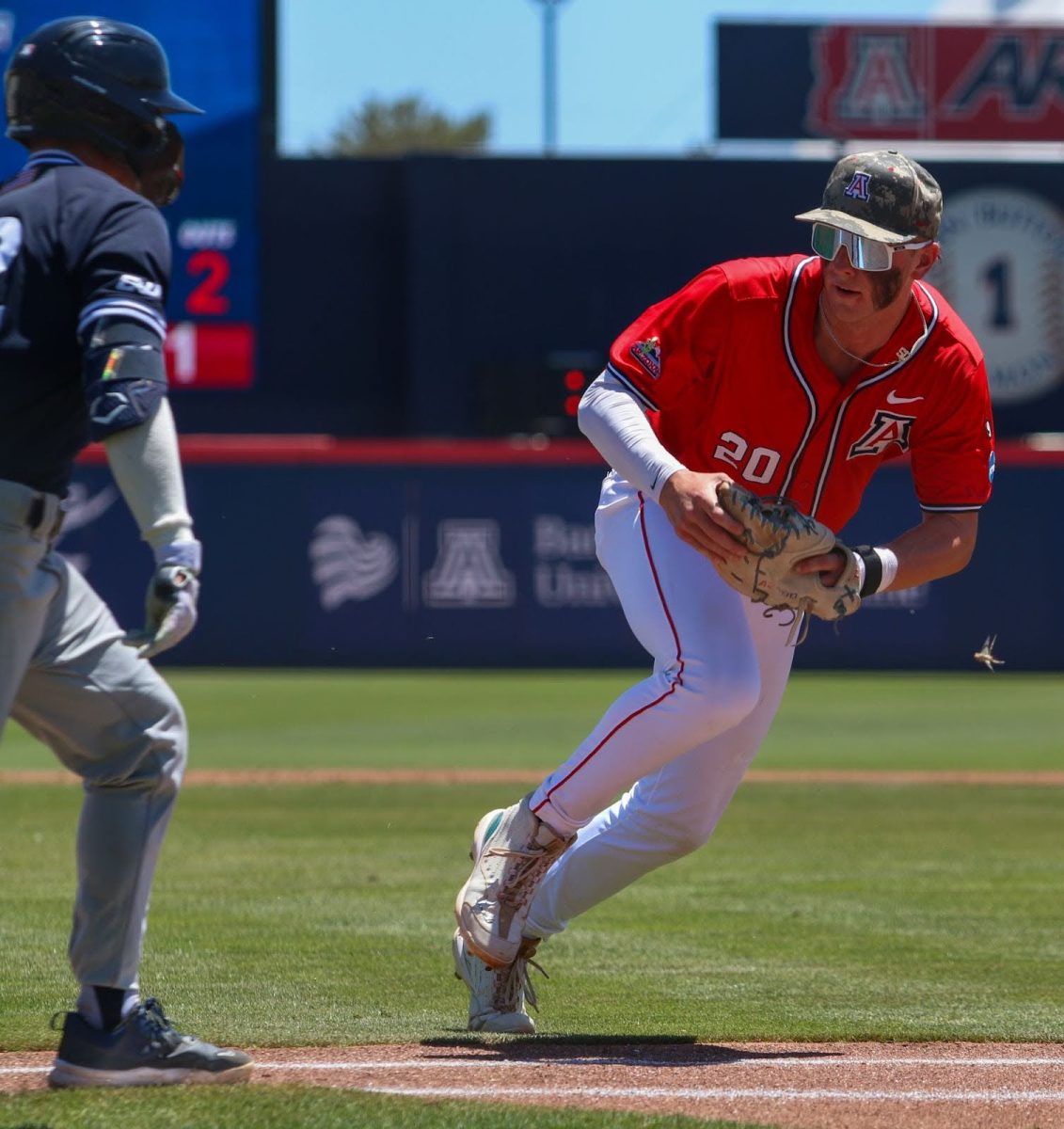 Tommy Splaine tracks down the batter heading towards base for the out on June 1 at Hi Corbett Field during the Tucson Regional of the NCAA Baseball Tournament. Despite being eliminated from the tournament, Arizona won both the regular season and tournament Pac-12 titles.
