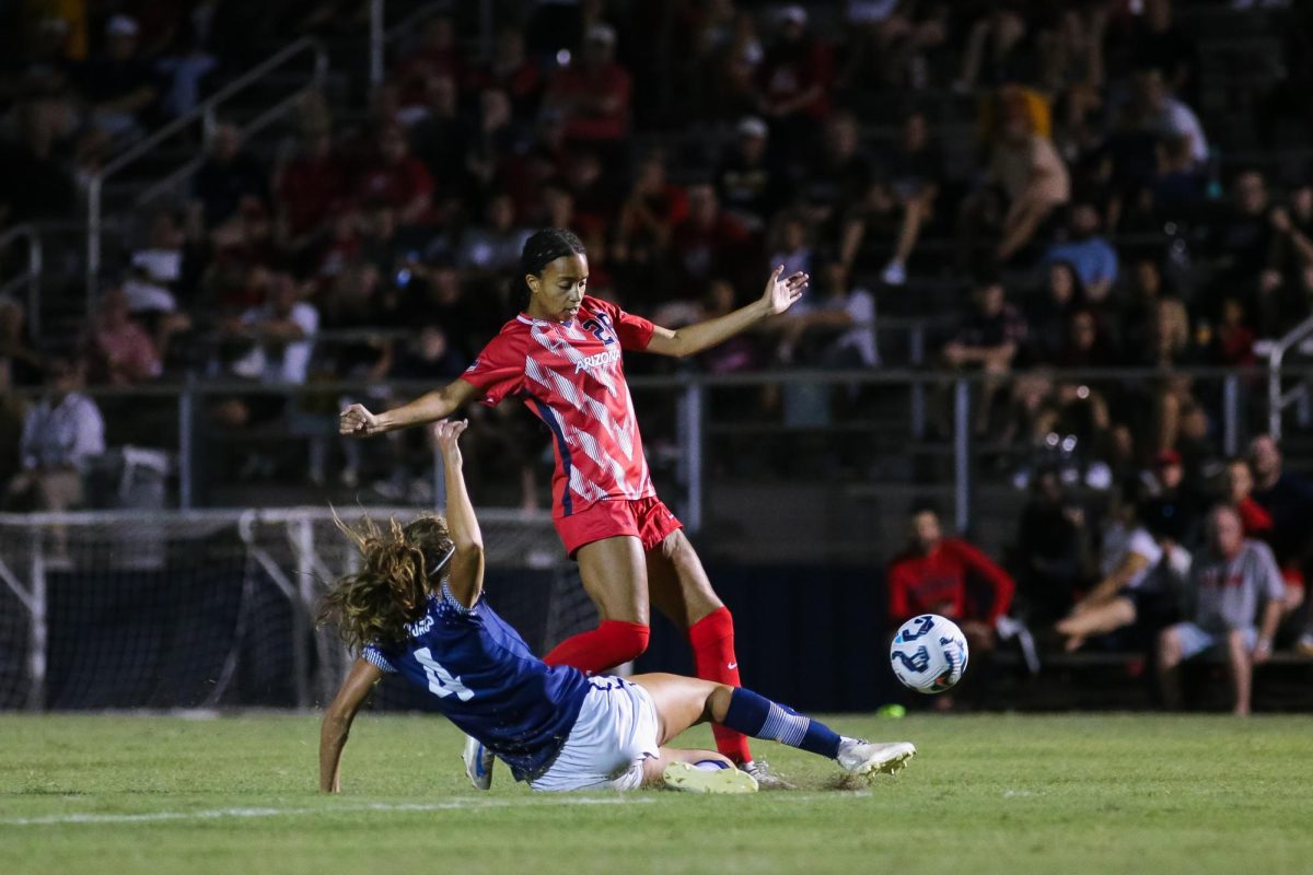 Narissa Fults' kick is blocked by an NAU tackle while attempting to score a goal on Aug. 22 at Murphy Field. Fults would score an assist of an early goal.