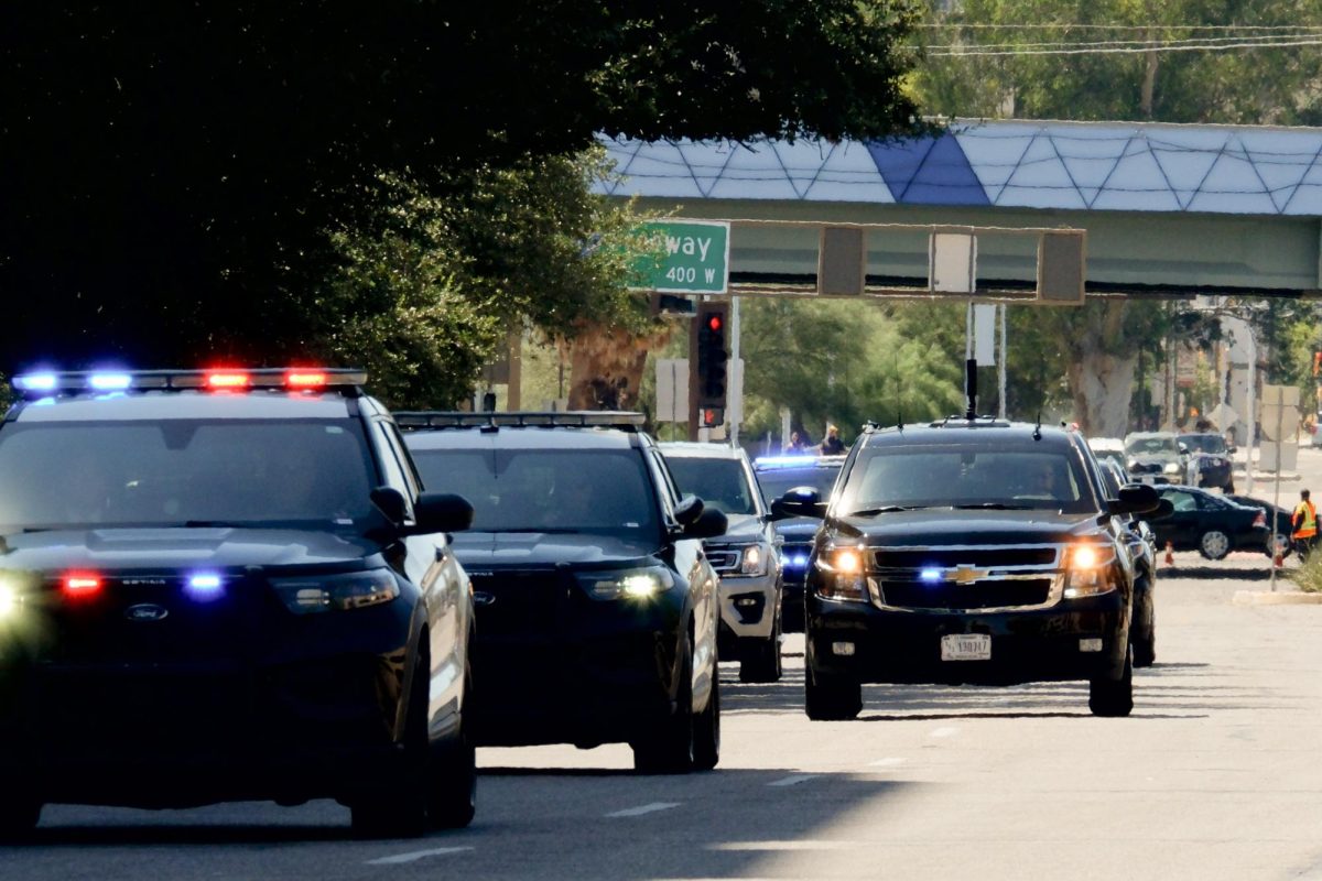 Black SUVs of Donald Trump’s motorcade arrive to Linda Ronstadt Music Hall on Sept. 12. The heavily protected convoy is run partially by local police and partially by Secret Service.