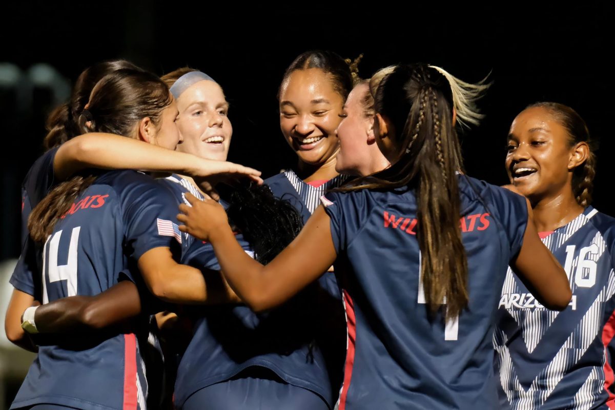 Teammates celebrate the goal of Nyota Katembo during the Arizona Wildcats’ game against the Cincinnati Bearcats on Sept. 26 at Murphey Field at Mulcahy Stadium. Katembo’s goal followed Gianna Christiansen’s goal just 30 seconds earlier.