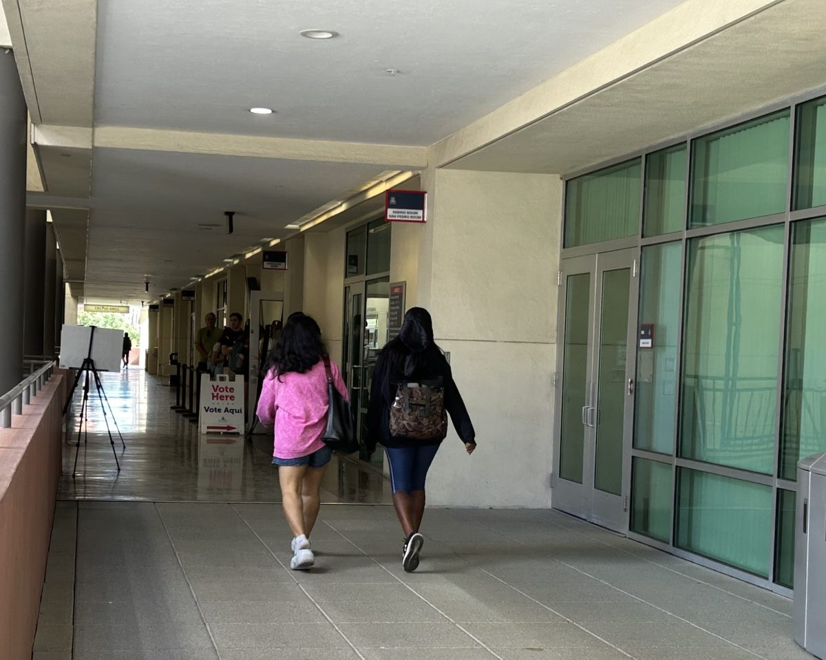 Students walk to drop off their ballot or early vote. Early voting continues on the third floor of the Student Union Memorial Center, Santa Cruz room. Early voting continues through Thursday Oct. 31 and election day is on Nov. 5. 