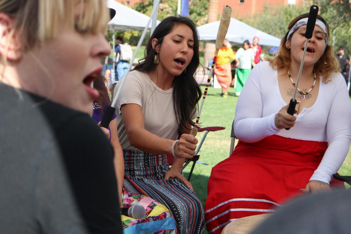 Members of Haven's Women's Drum Group perform for Indigenous Peoples' Day on the UA Mall on Oct. 14. They sang about humility, safety and missing Indigenous women.