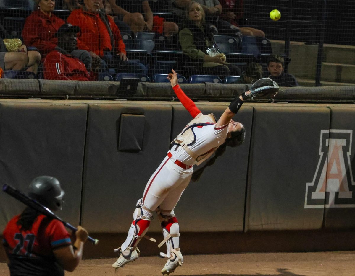 Emma Kavanaugh reaches for a fly ball at Hillenbrand Stadium on Oct. 18. Kavanaugh is a freshman from  Barrington, Ill.