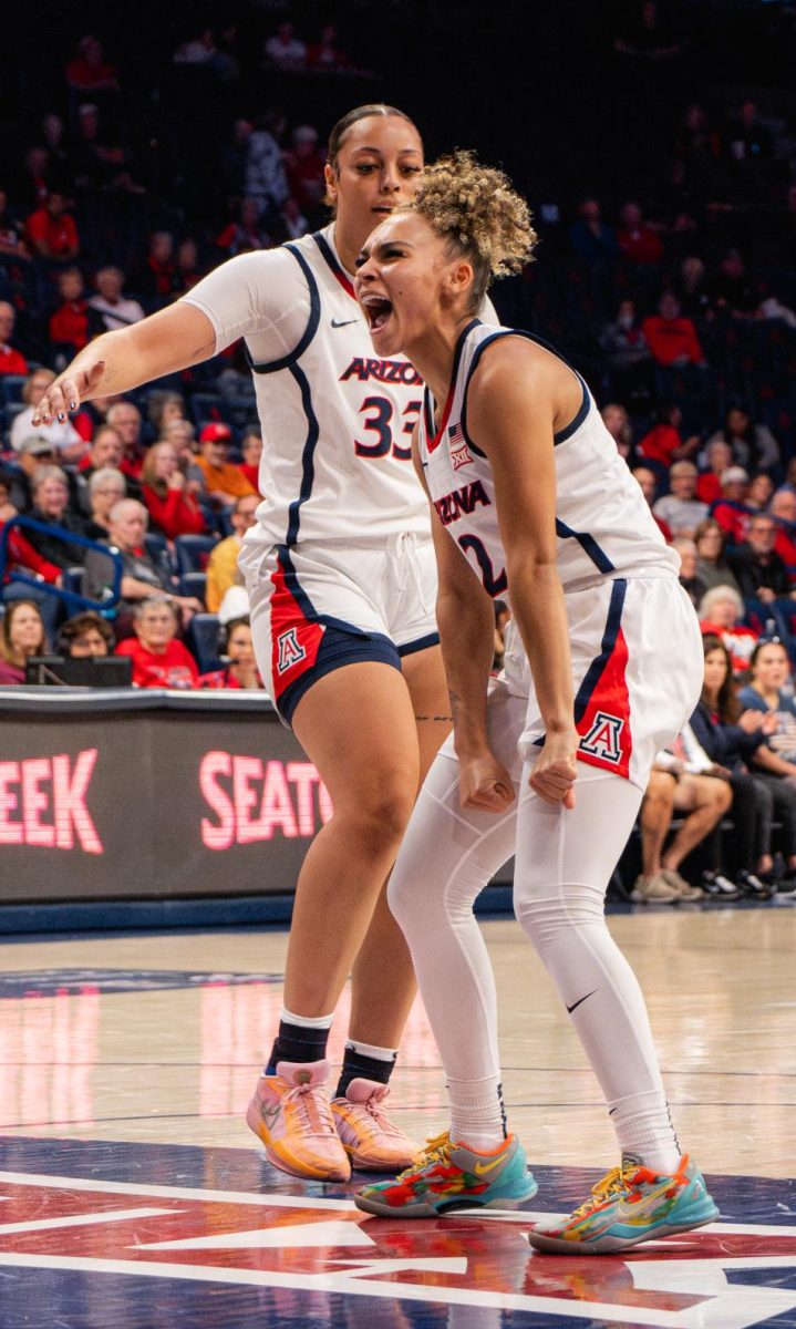 The University of Arizona's Jada Williams celebrates on the court of McKale Center on Nov. 4 against UT Arlington. UA held the lead at halftime with a score of 34-21.