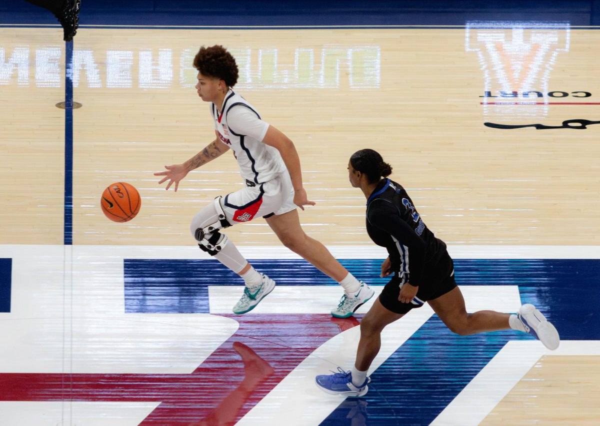 Arizona's Montaya Dew treks down the court in McKale Center during their game with UT Arlington on Nov. 4. The final score was 73-54 where UA took the win.