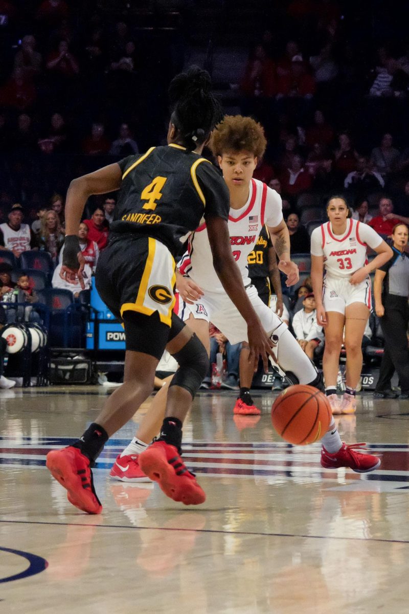 Jada Williams guards Grambling State’s Nicole Sandifer in the first half of the Arizona women’s basketball game against Grambling State on Nov. 23 in McKale. The Wildcats struggled to hold a lead over Grambling during the first half.