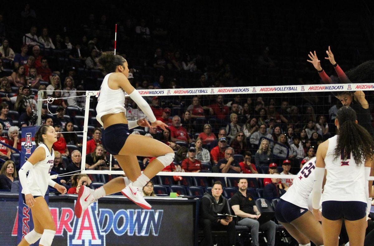 University of Arizona volleyball player Jordan Wilson sends the ball over the net in McKale Center on Nov. 23. Wilson had 15 kills, 4 blocks and 1 ace. 