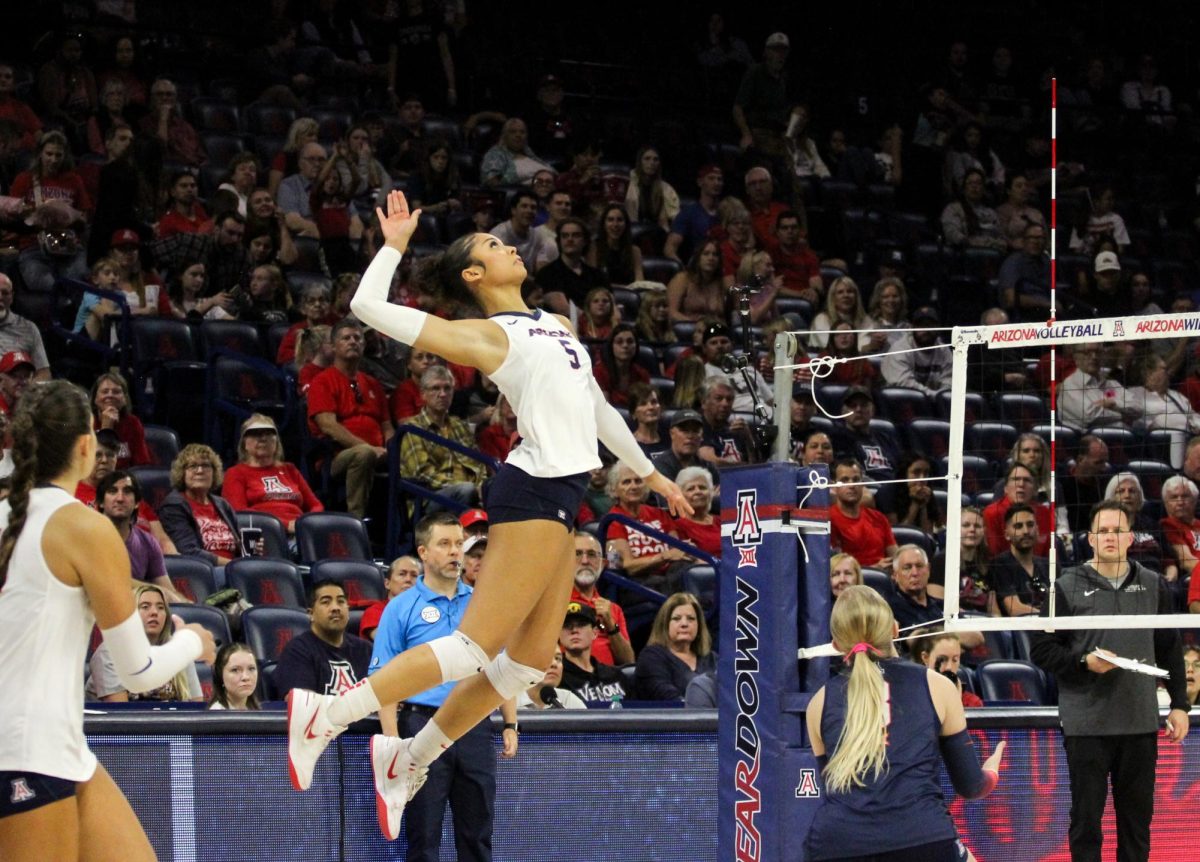 University of Arizona volleyball player Jordan Wilson hits the ball in McKale Center on Nov. 23. The Wildcat's won against Iowa State University 3-1. 