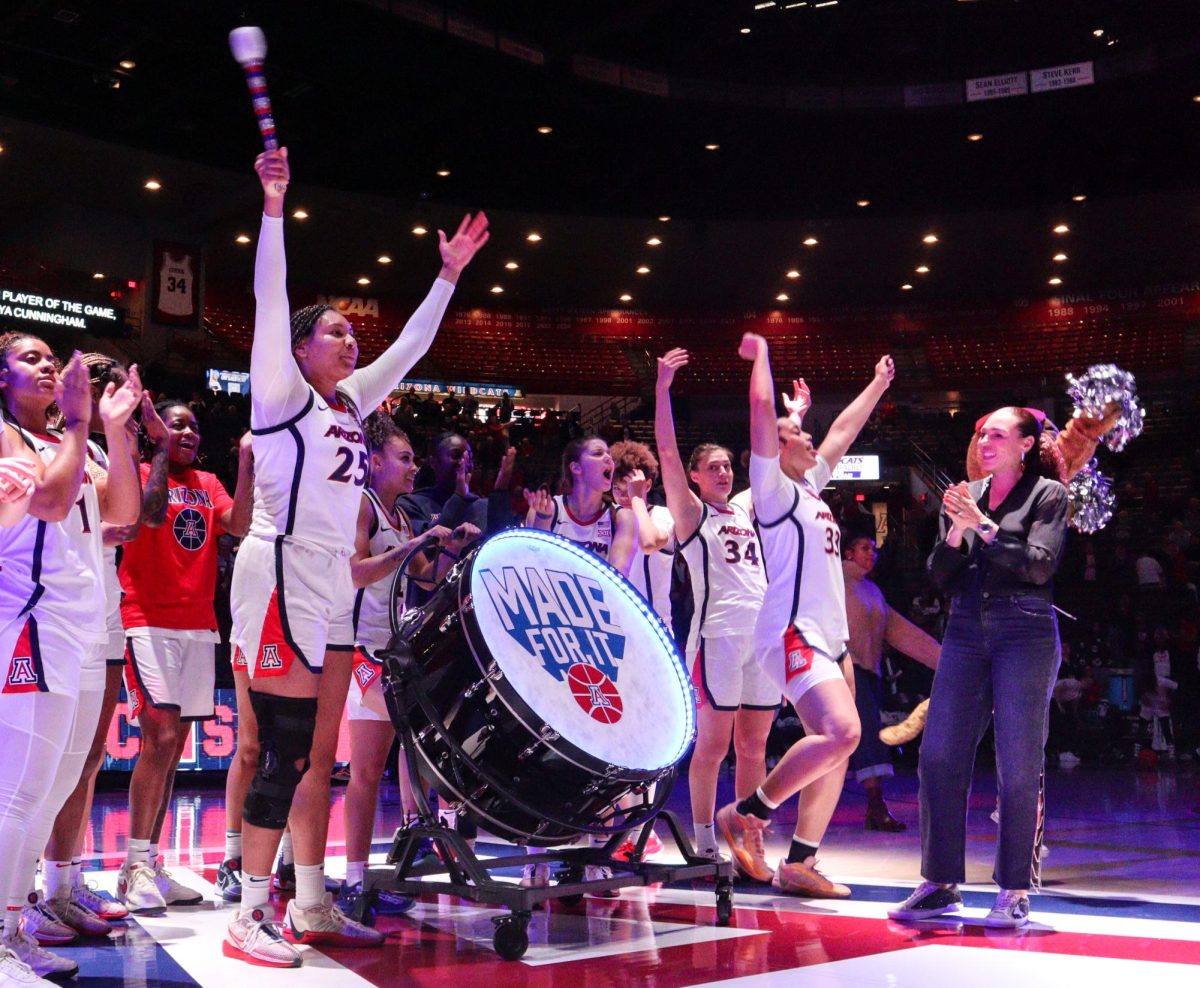 University of Arizona womens basketball player Breya Cunningham bangs the drum eight times after the game against California State University, Bakersfield on Dec. 10 in McKale Center. Cunningham put up 13 points and contributed 5 rebounds. 