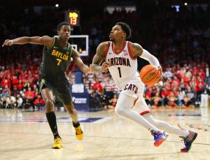 Caleb Love drives to the basket late in the second half to maintain a double digit lead against Baylor on Jan. 15 in McKale Center. The Wildcats won the game 81-70.