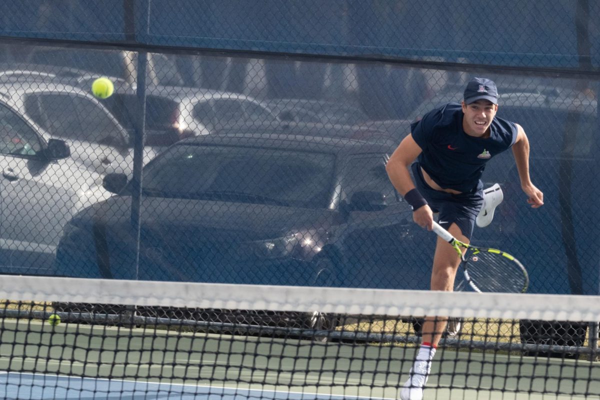  Zoran Ludoski returns a ball during a match on Jan. 25 at Robson Tennis Center. Ludoski is a freshman and is playing his first season of college tennis.