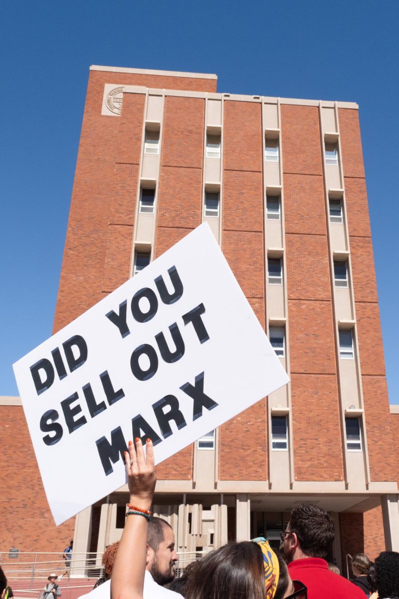 "Did you sell out Marx" reads a sign in front of the Administration building on Feb. 27. Protest signs like this were a common sight during the protest which demanded the University keep its D.E.I. policies in place.