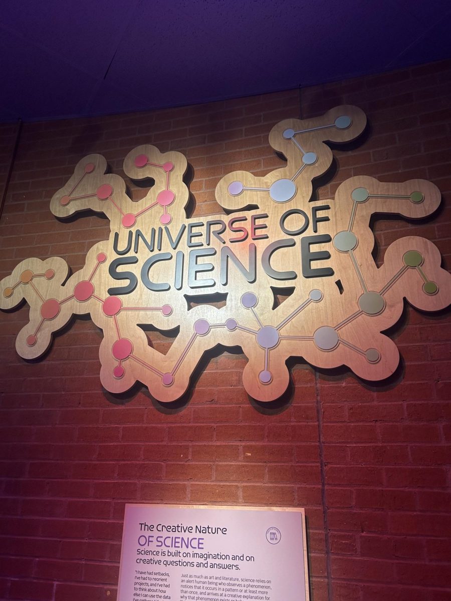 The entrance to the Universe of Science exhibit welcomes visitors to explore the different fields of science.