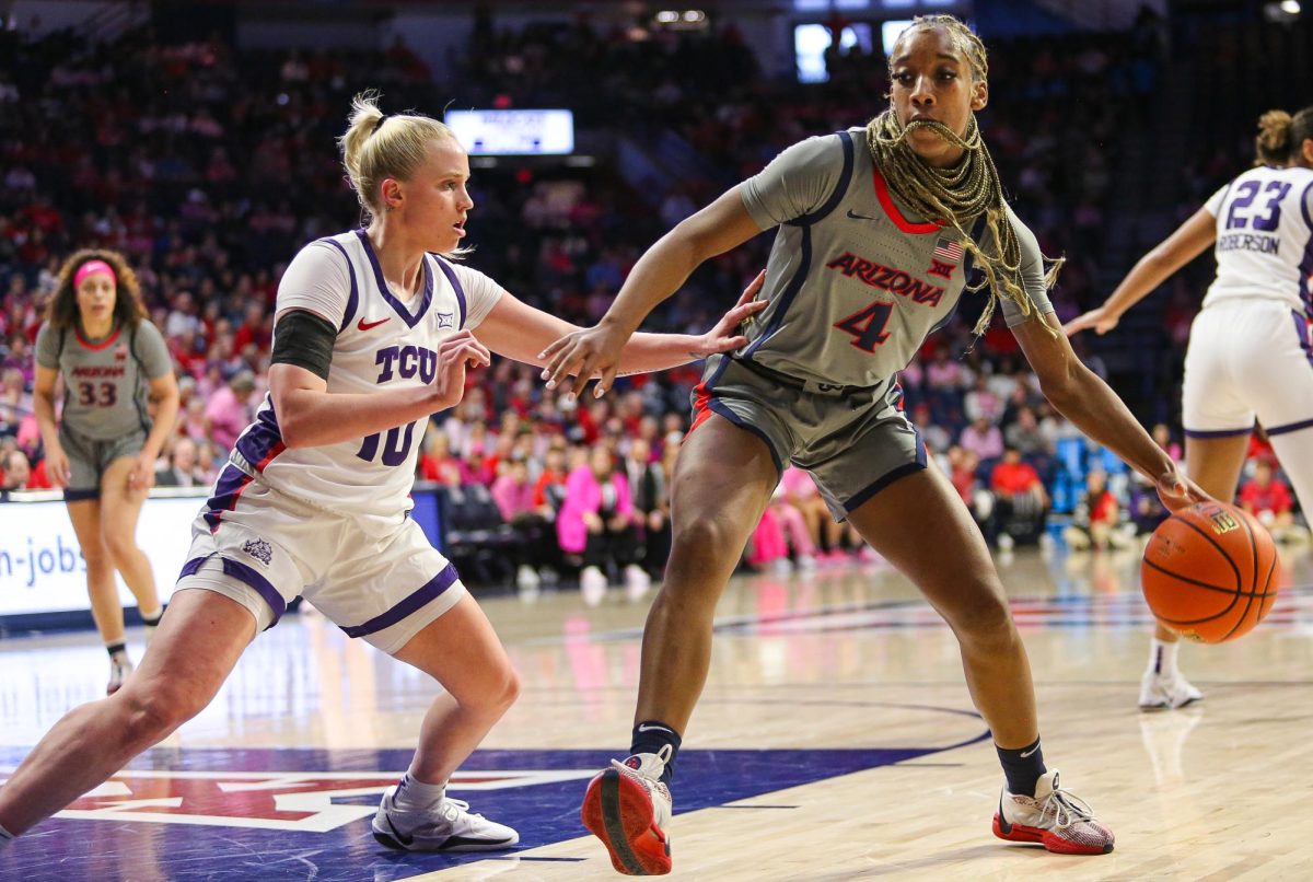 Skylar Jones works her way to the basket against TCU's Hailey Van Lith in McKale Center on Feb. 16.  Skylar had a career night with 30 points on 4-4 3 pt shooting.