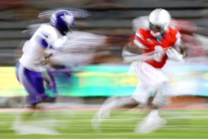 Wesley Yarbrough runs the ball against Weber State just after midnight on Sep. 7 at Arizona Stadium.