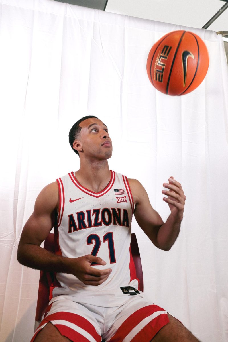 Evan Nelson poses for a photo at Arizona Men’s Basketball media day in McKale Center on Sept. 17.