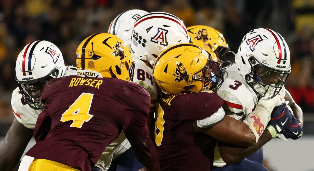 Kedrick Reescano rushes the ball against ASU at Mountain America Stadium on Nov. 28.