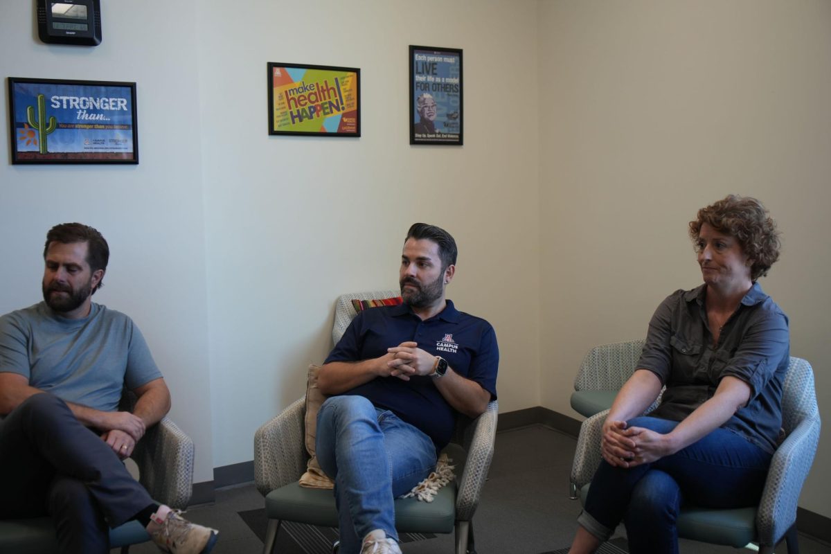 Members of the Counseling and Psychological Services team sit together at the University of Arizona in Tucson, Ariz. A new partnership with Sierra on Campus allows CAPS to provide intensive mental health programs to students while being flexible around school schedules. 