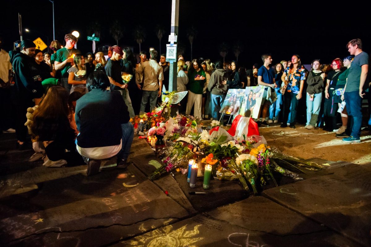 A memorial is set up at Second Street and Euclid Avenue for the victims of the hit-and-run accident that occurred on Oct. 30.