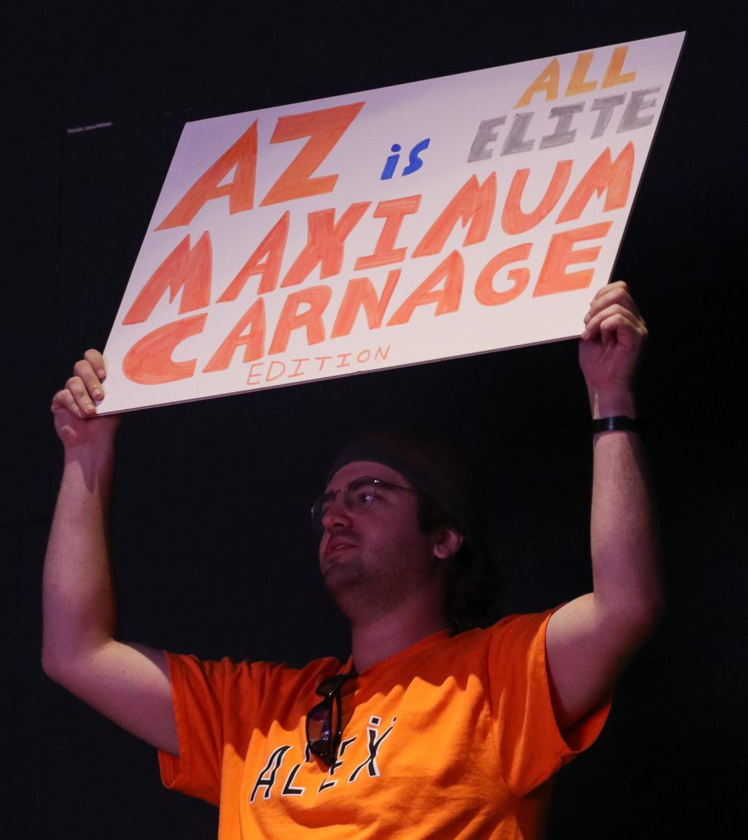 A fan holds up a sign during AEW Dynamite in Arizona Financial Theater in Phoenix on Jan. 14.
