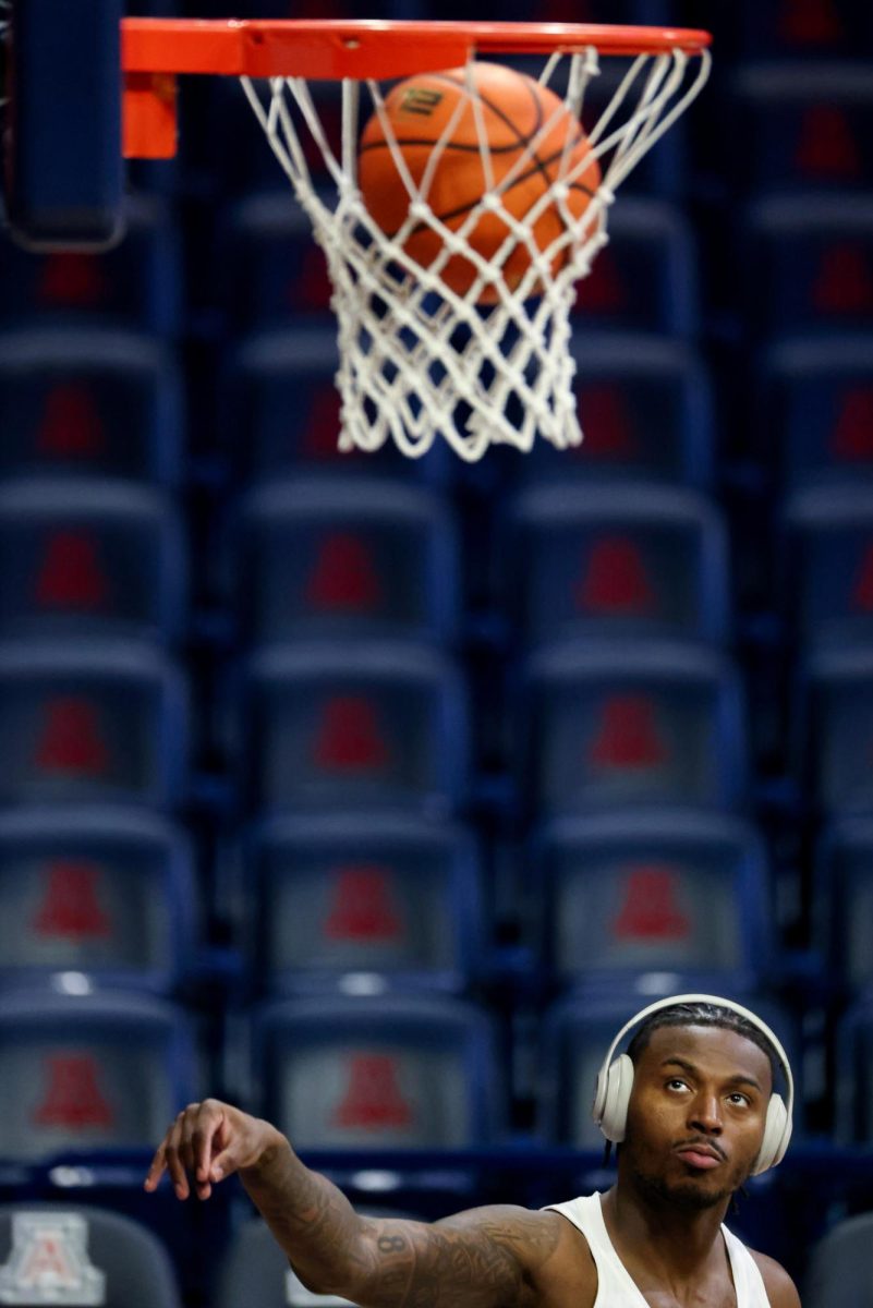 Jaden Bradley takes warm up shots before playing against Kansas State in McKale Center on Jan. 7