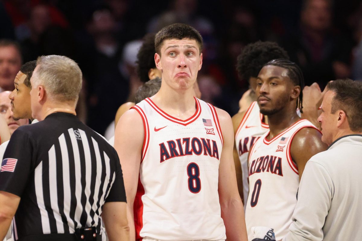 Ivan Kharchenkov makes a face after a call review against Kansas State in McKale Center on Jan. 7.