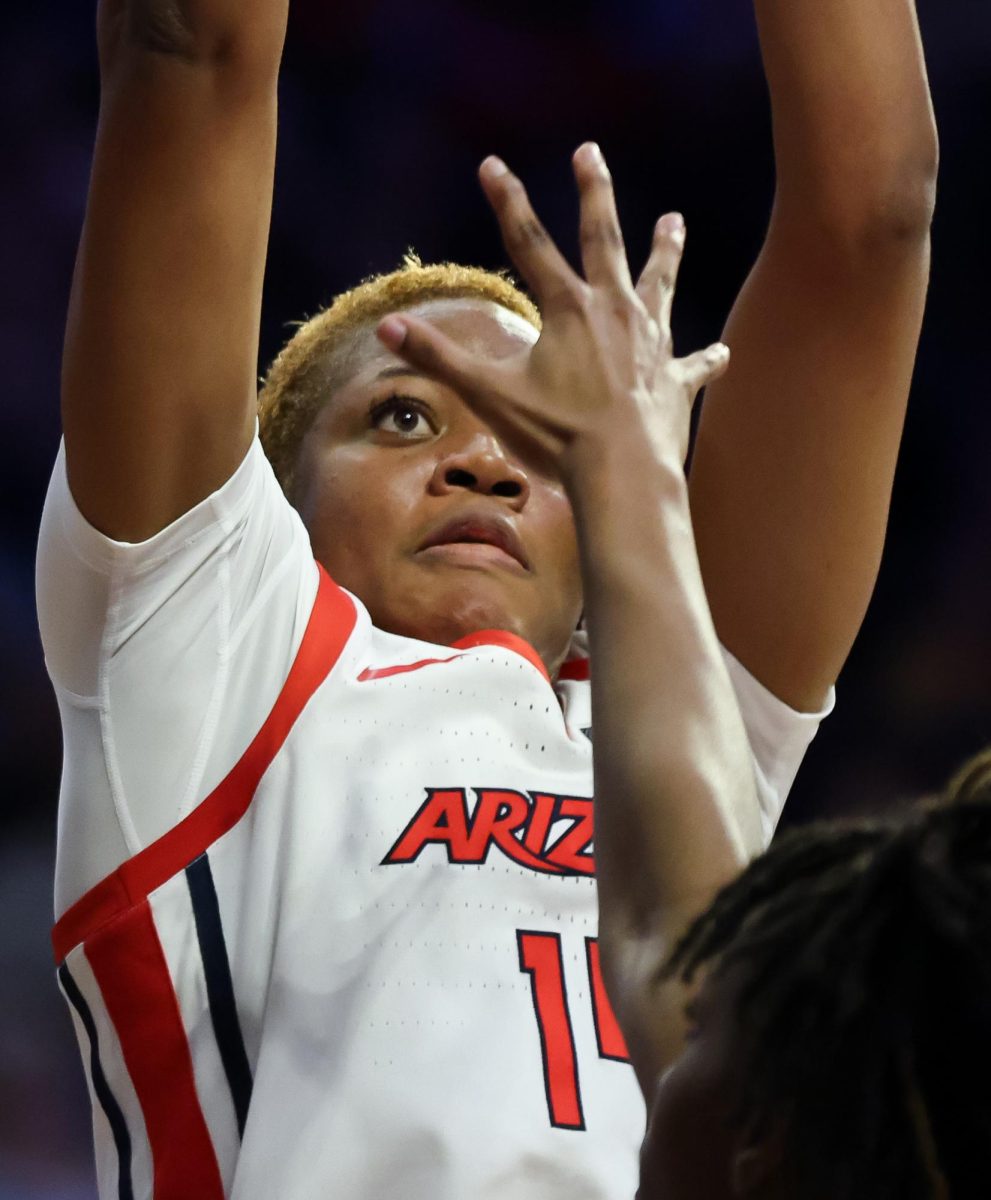 Adebanjo Blessing shoots the ball against Kansas State in McKale Center on Feb. 4.