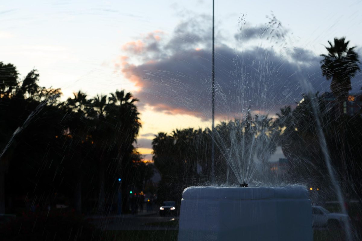 UA fountain at Old Main, where student clubs have been known to frequently do initiation baptisms.