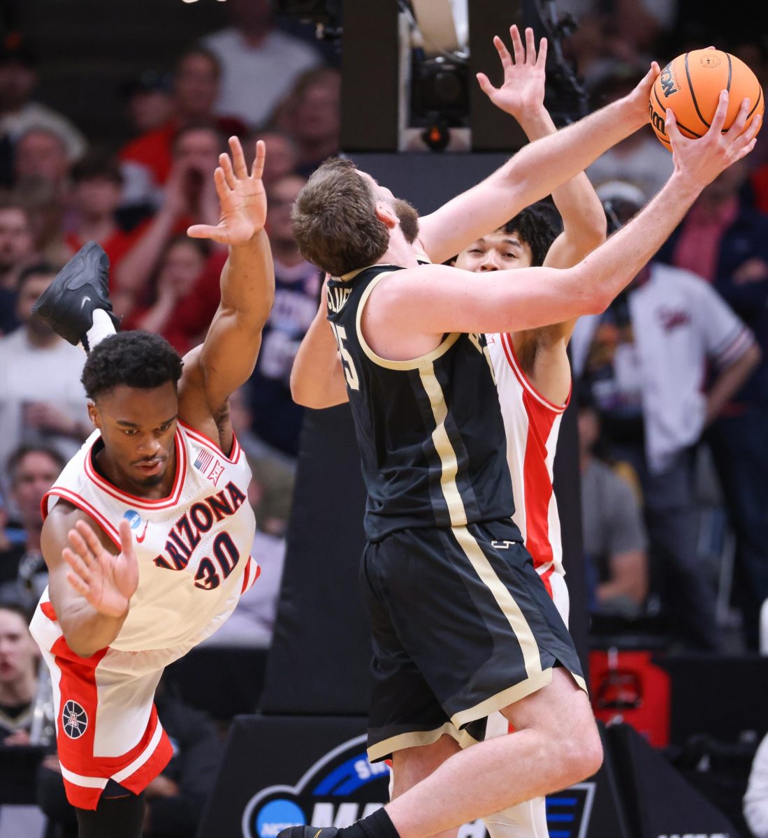 Tobe Awaka misses a block against Purdue University on March 28 in SAP Center in San Jose, California.
