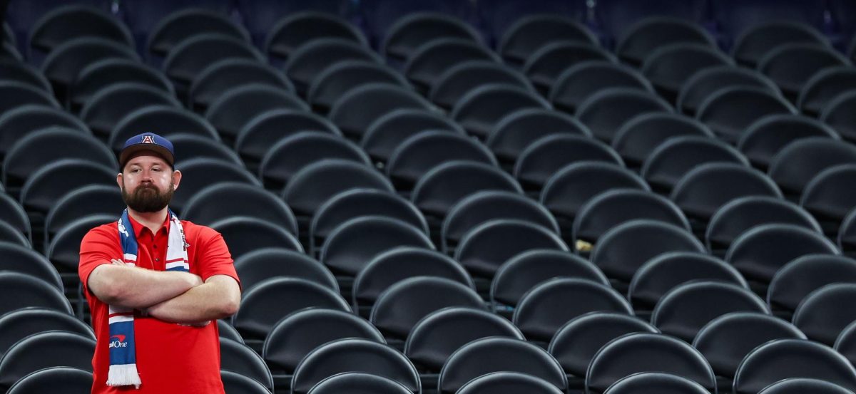 A University of Arizona fan looks on following a loss to the University of Michigan in the Final Four in Lucas Oil Stadium in Indianapolis on April 4.