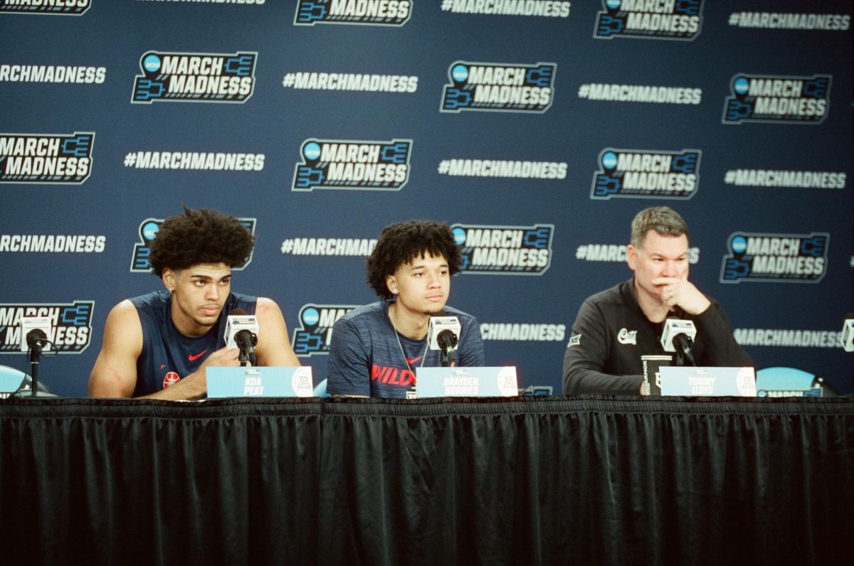 (Left to Right) Koa Peat, Brayden Burries and Tommy Lloyd take questions during a press conference in San Diego on March 20.