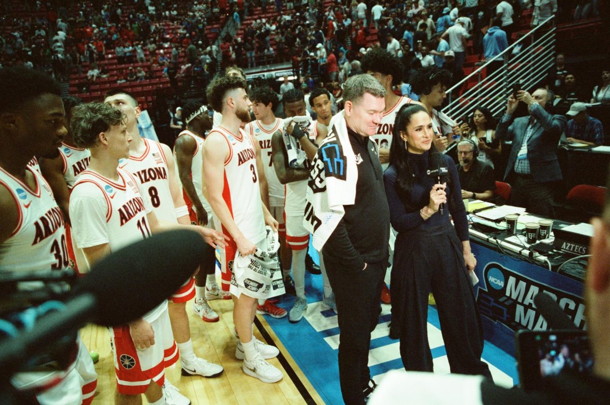 Tommy Lloyd is interviewed following a win over Long Island University in Viejas Arena in San Diego on March 20.