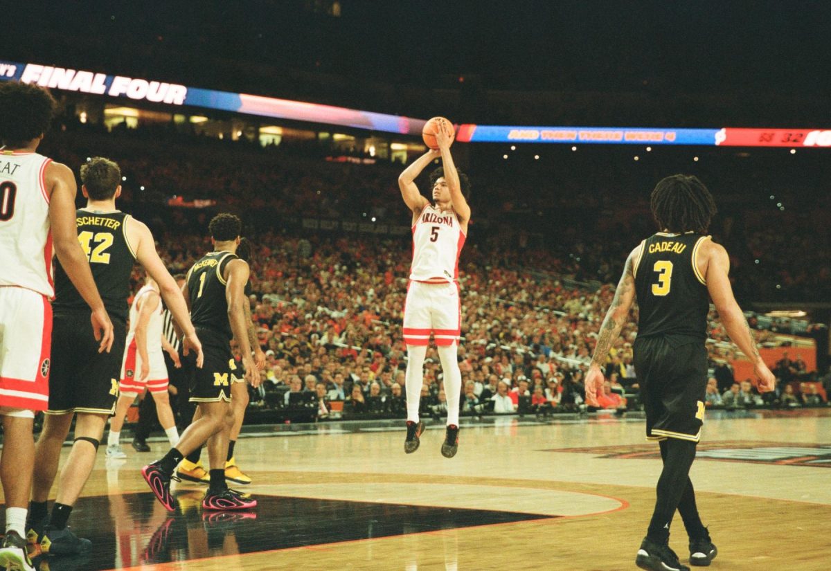 Brayden Burries shoots the ball following the play being called dead in Lucas Oil Stadium in Indianapolis on April 4.