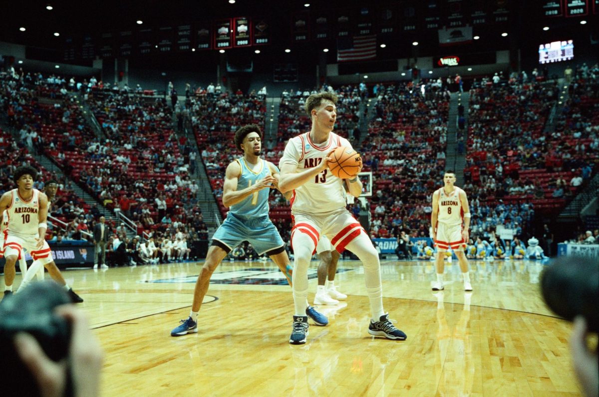 Motiejus Krivas grabs a rebound against Long Island University in Viejas Arena in San Diego on March 20.