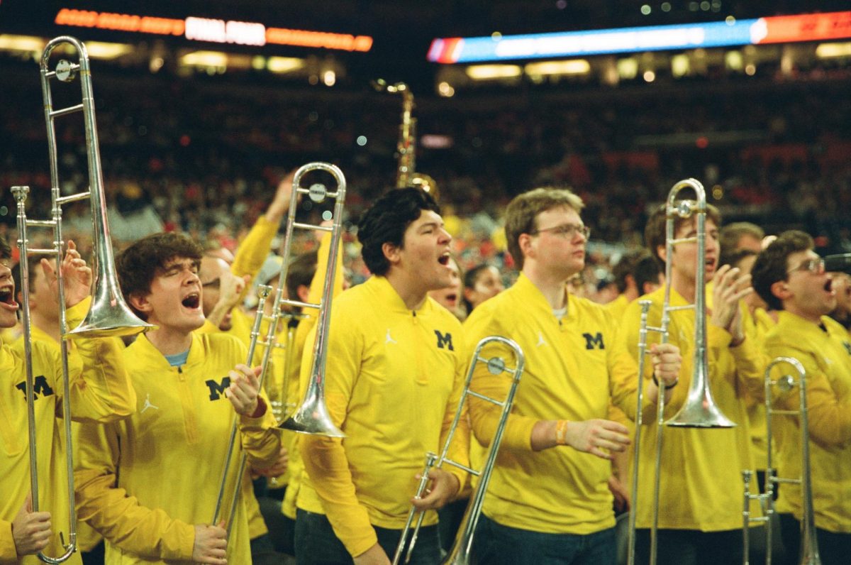 The University of Michigan's band gets hyped during their Final Four game against the University of Arizona in Lucas Oil Stadium on April 4.