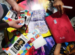 Collectors gather at the official Panini trading booth to swap stickers before the USA vs Australia match at The Wharf in Washington D.C. on June 19.