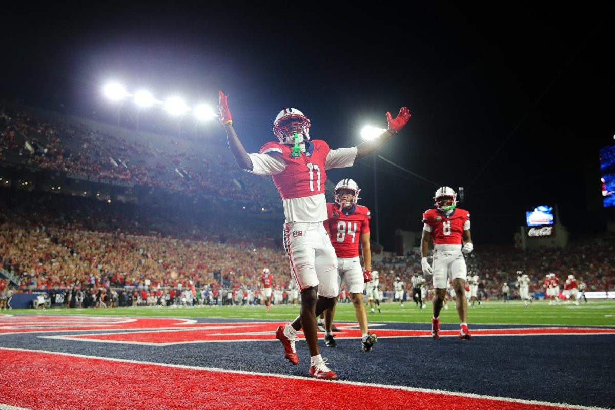 Chris Hunter III celebrates after a touchdown against NIU on Sept. 19 at Casino Del Sol Stadium.