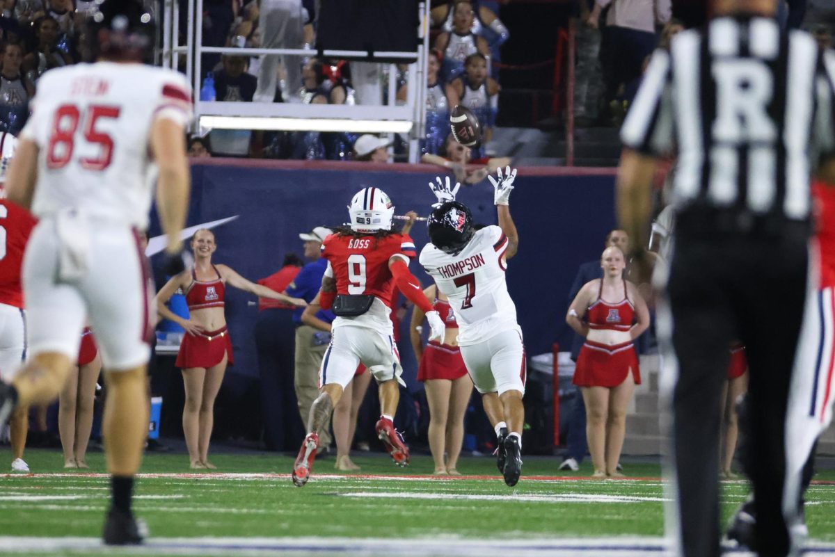 Cam Thompson catches a 52 yard touchdown pass to put NIU up 10-0 in the first quarter on Sept. 19 at Casino Del SOl Stadium